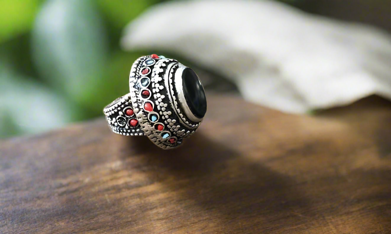 Kuchi rings with glass inlays

