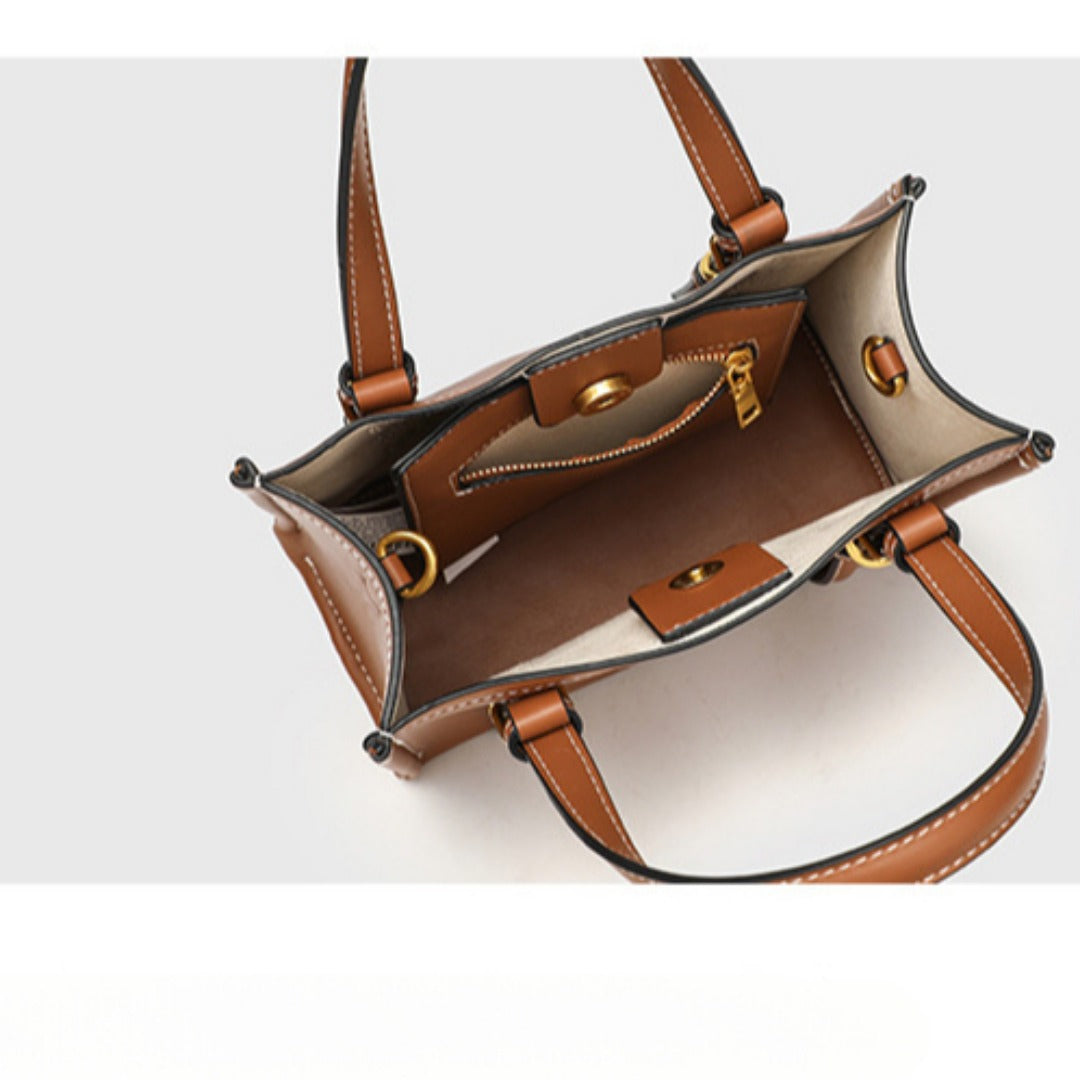 Brown leather handbag with gold accents