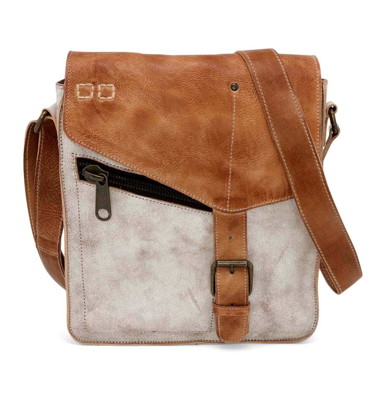 Brown leather crossbody bag with a white patch on a white background