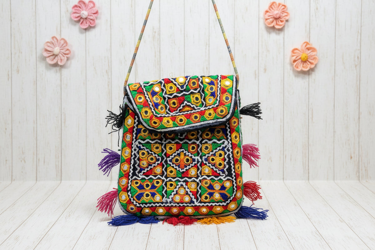 Embroidered mirror work clutch