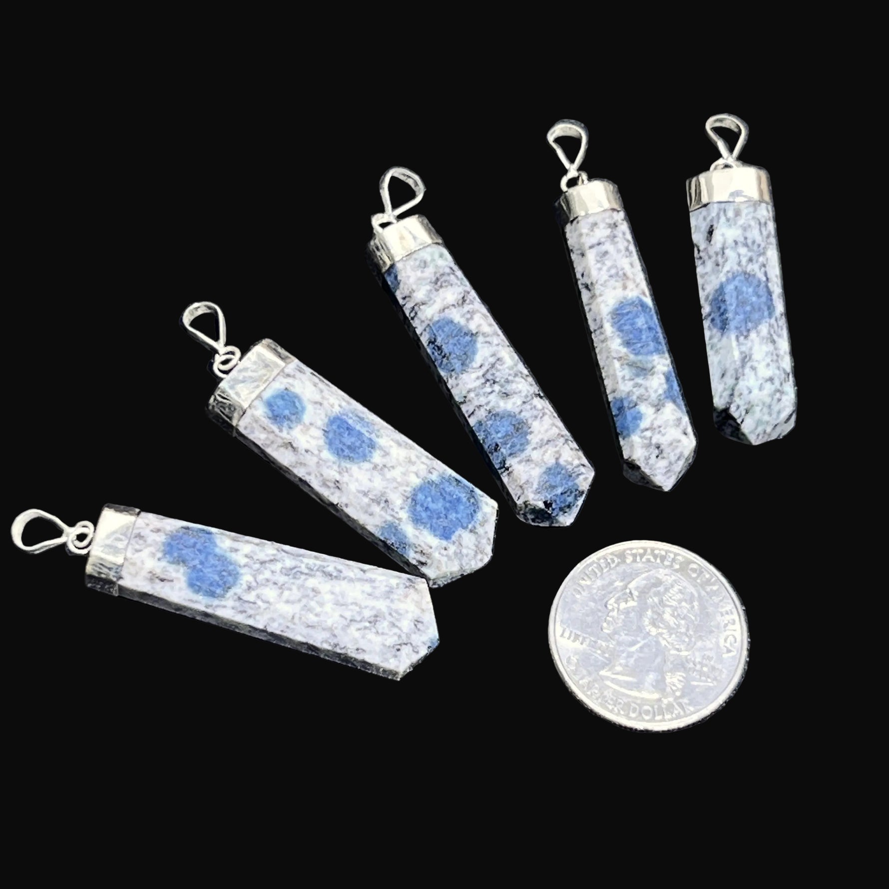 Set of crystal pendants with blue inclusions 