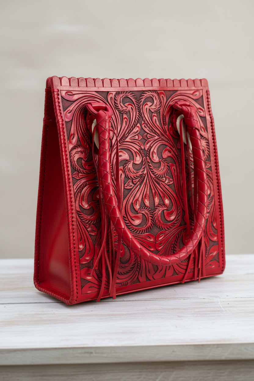 Red leather handbag with boho style patterns