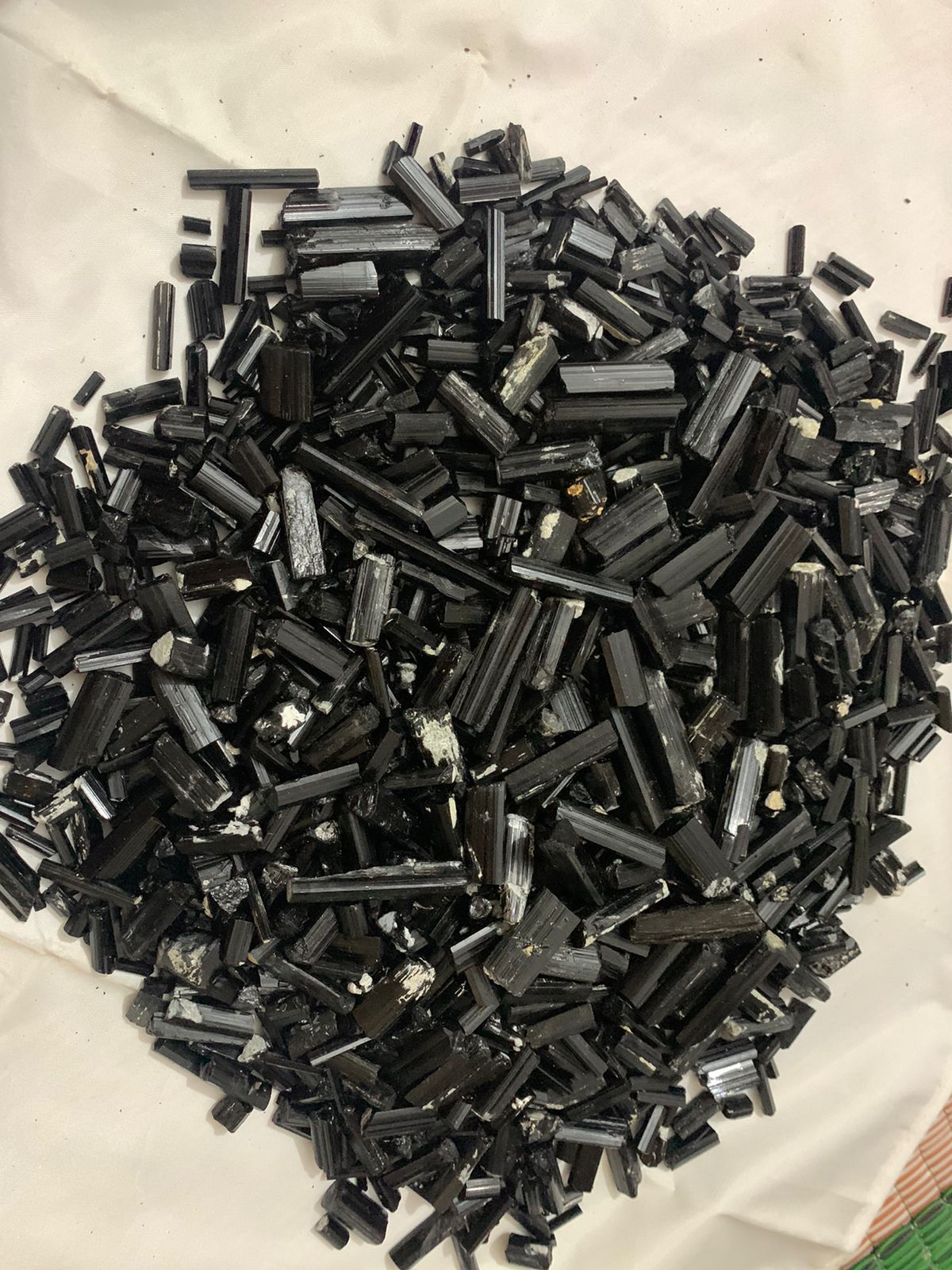 Explore black tourmaline raw stones for grounding chakra