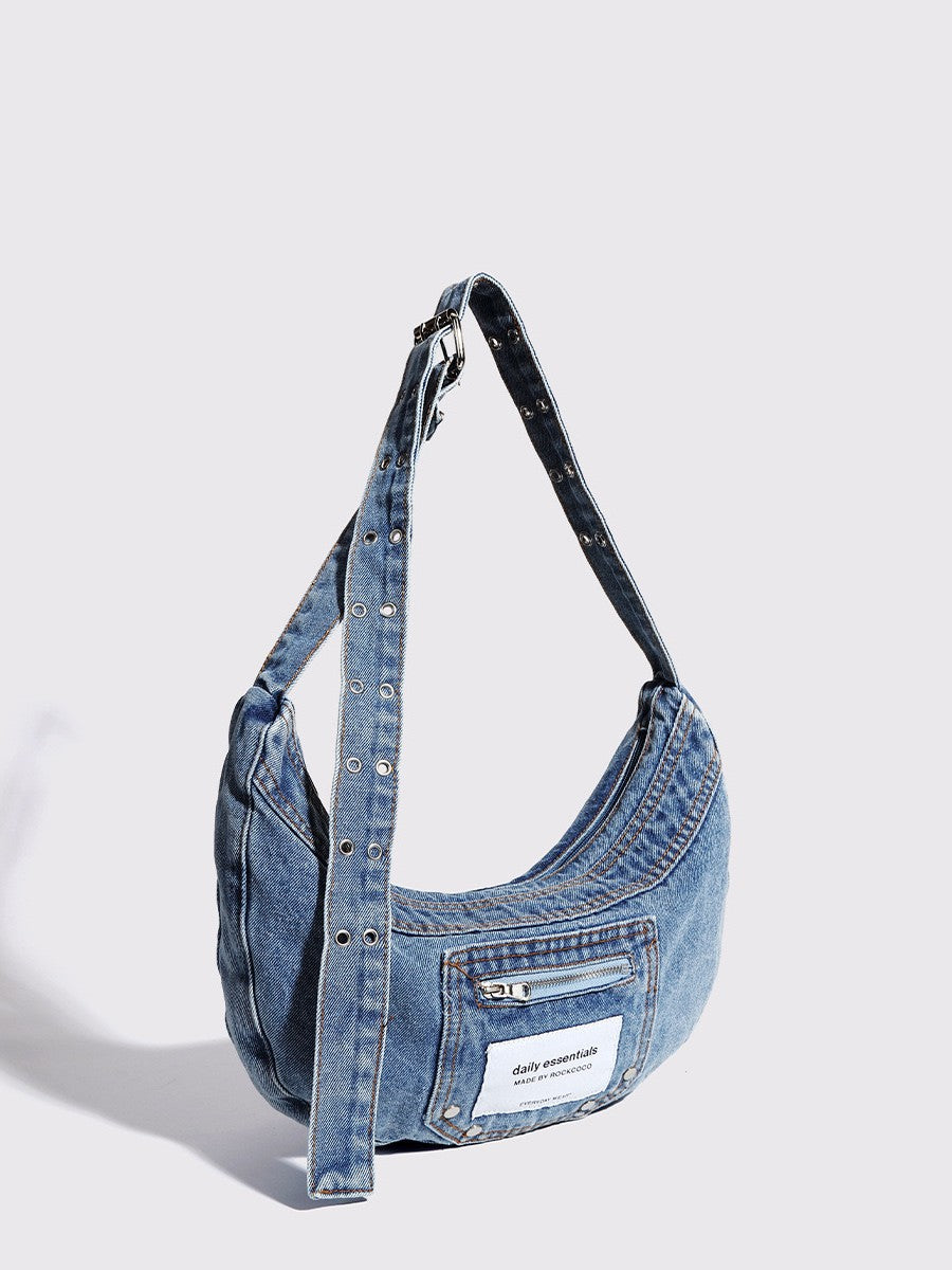 blue and black denim shoulder purse