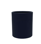 A dark navy blue cylindrical container for packing cosmetic