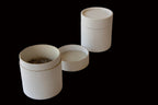 Three white eco-friendly cylindrical containers for food