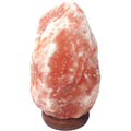Himalayan salt lamp on a white background