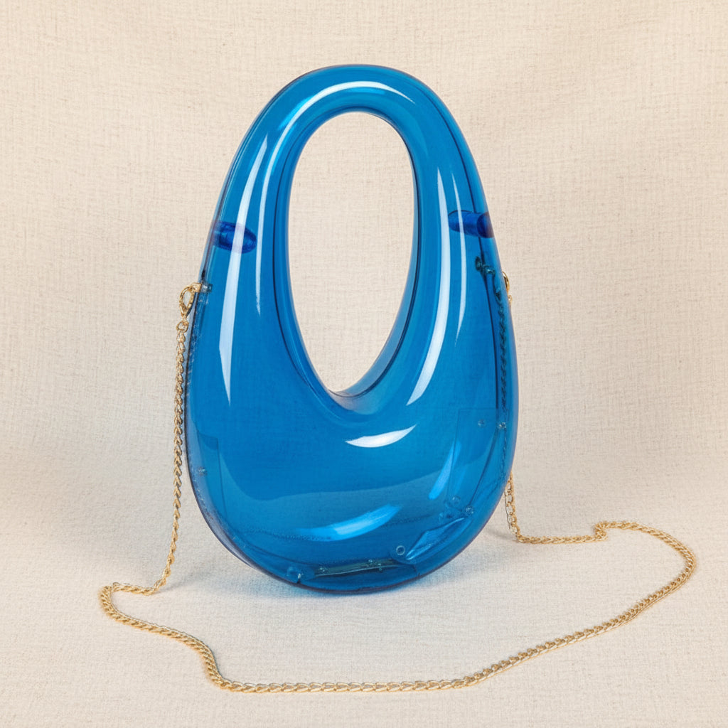 oval box bag for wedding guest outfit

