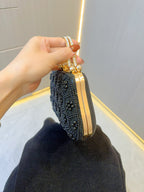 rhinestone embellished clutch bag with top handle