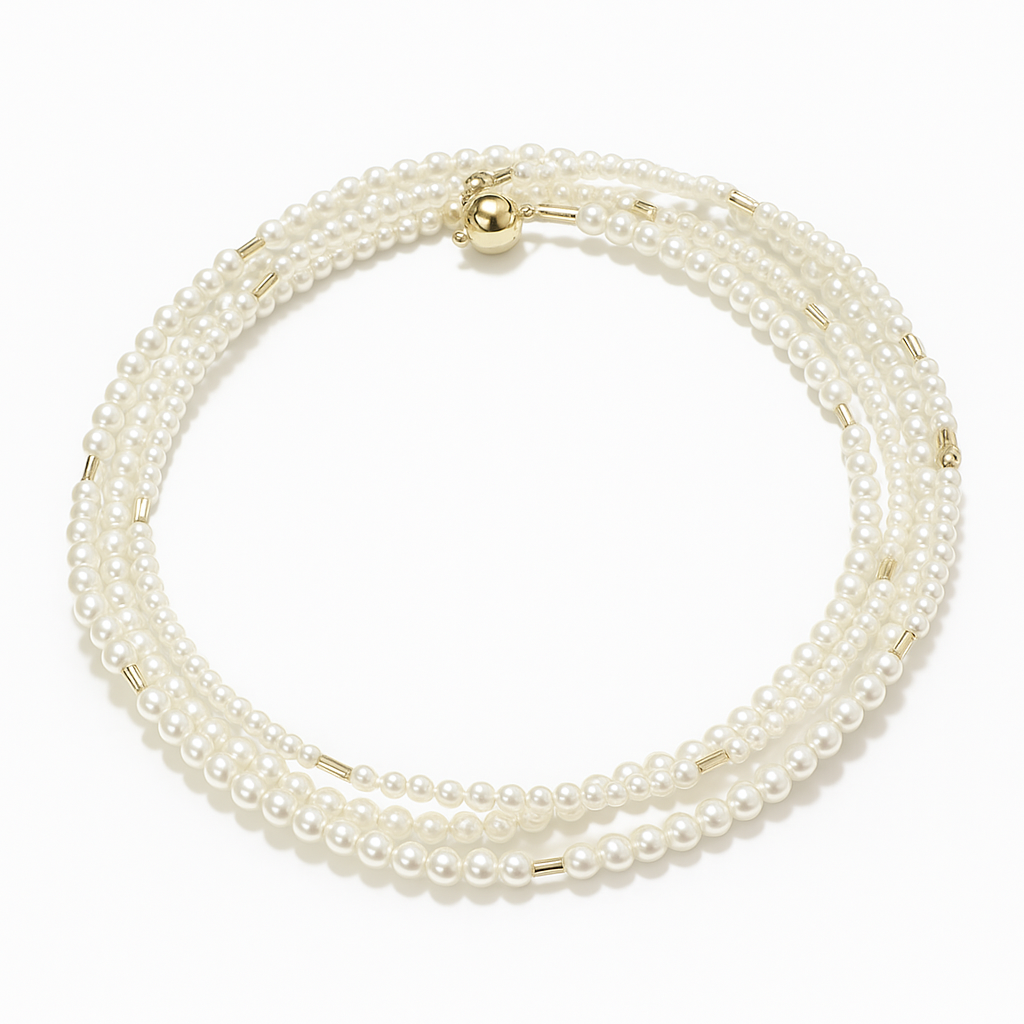 Multi-layered pearl bracelet with gold accents