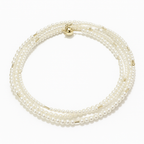 Multi-layered pearl bracelet with gold accents