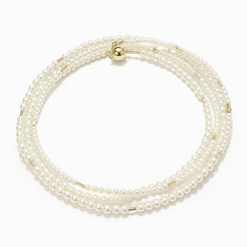 Multi-layered pearl bracelet with gold accents