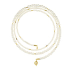 Three pearl necklaces with gold clasps on a white background