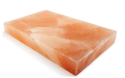 Rectangular pink salt block on a white background