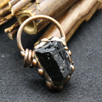 unpolished gemstone pendant