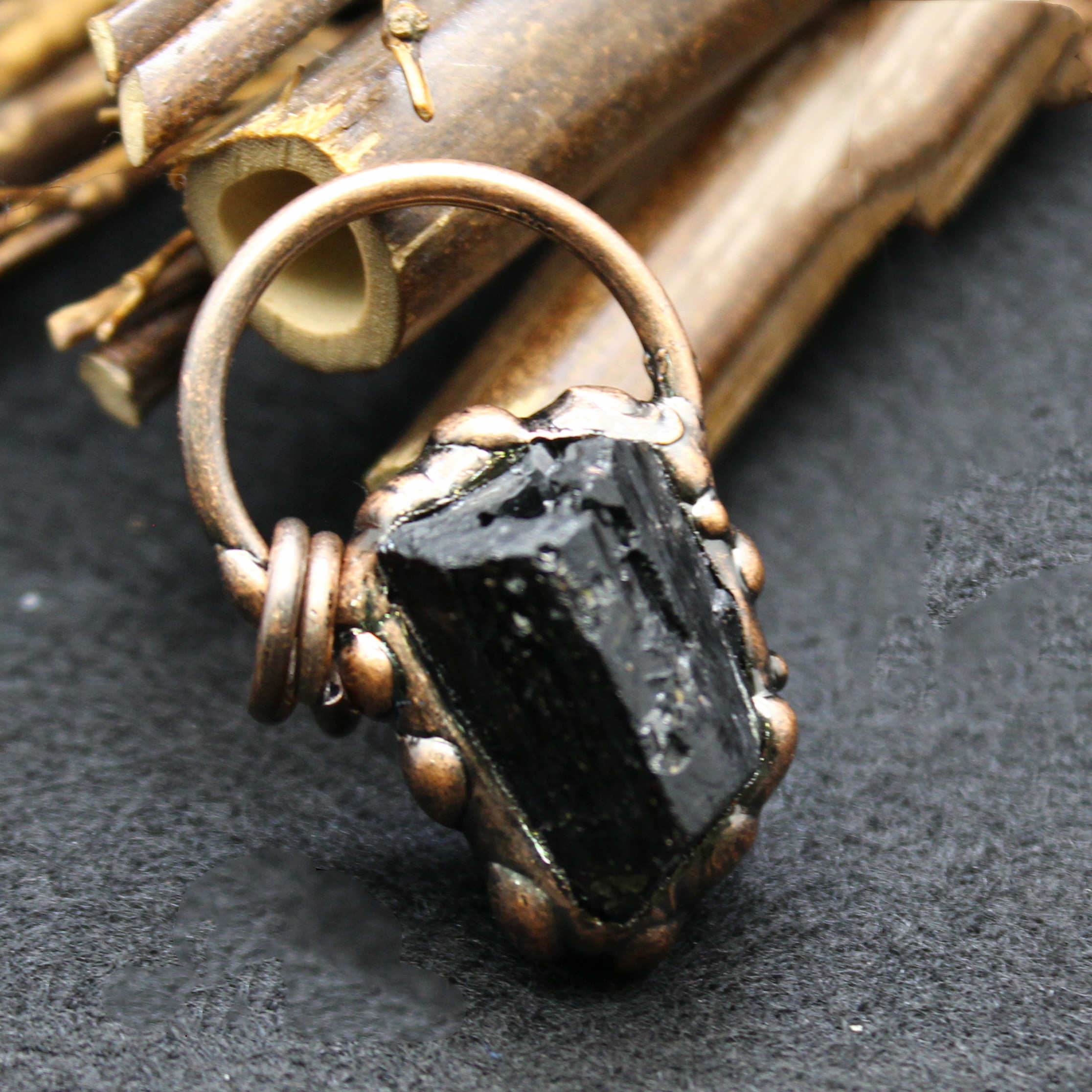 unpolished gemstone pendant