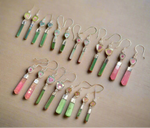 Set of colorful earrings with raw tourmaline crystals