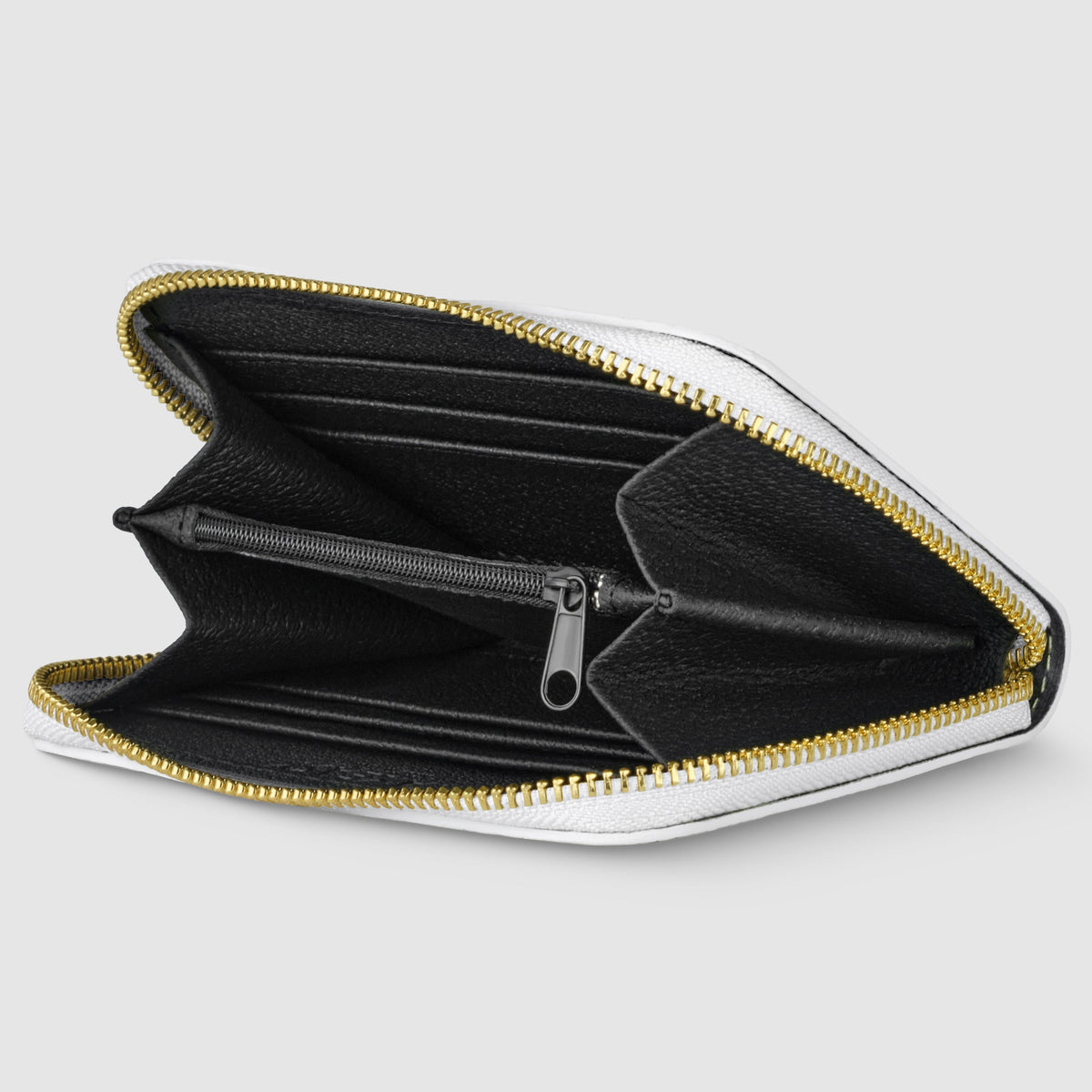 Black wallet with gold zipper on a light gray background
