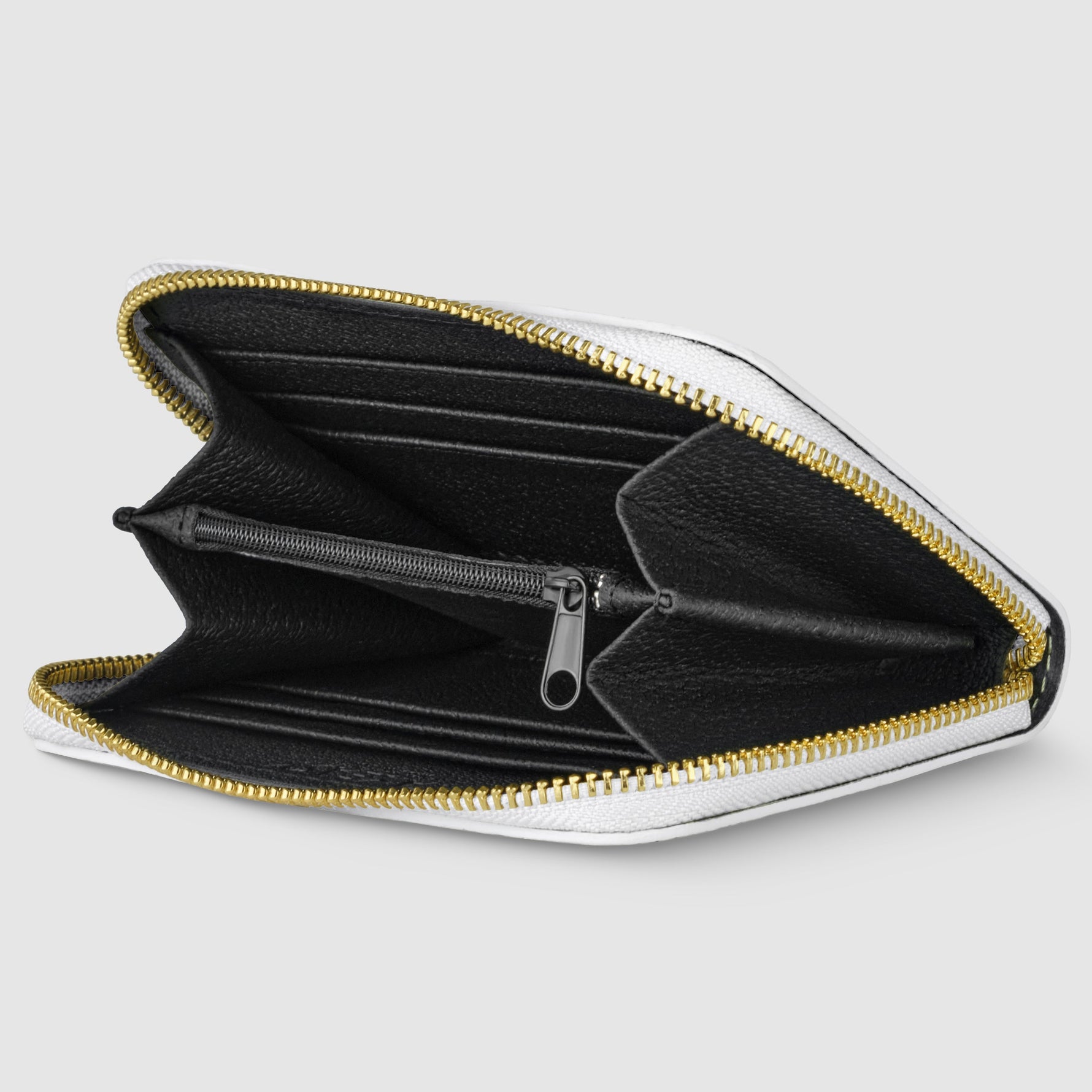 Black wallet with gold zipper on a light gray background