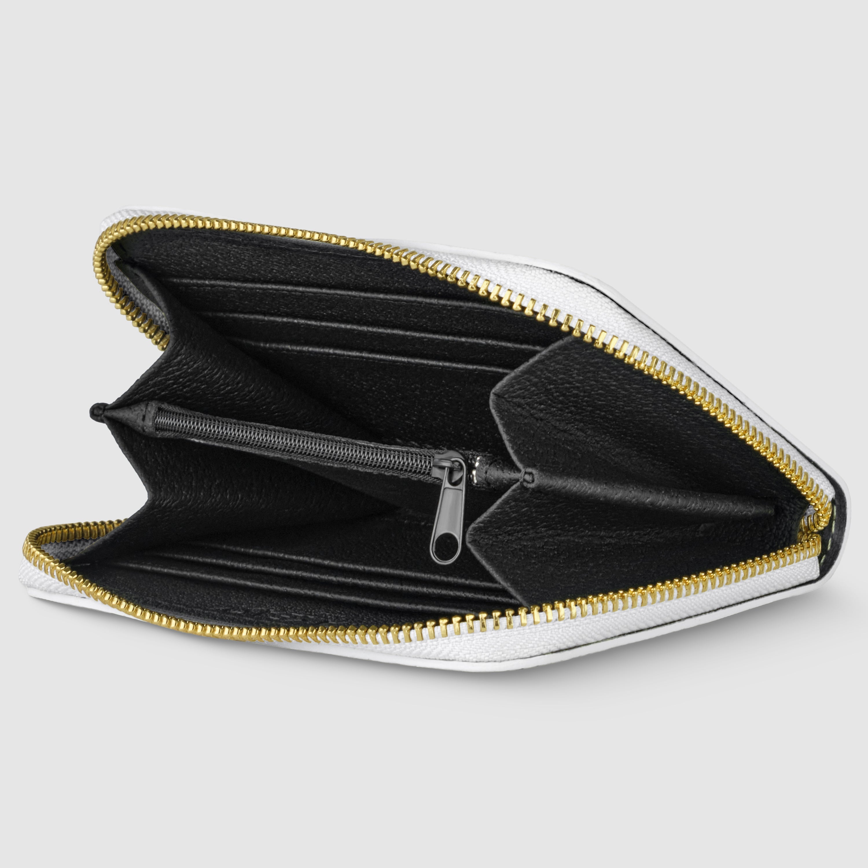 Black wallet with gold zipper on a light gray background